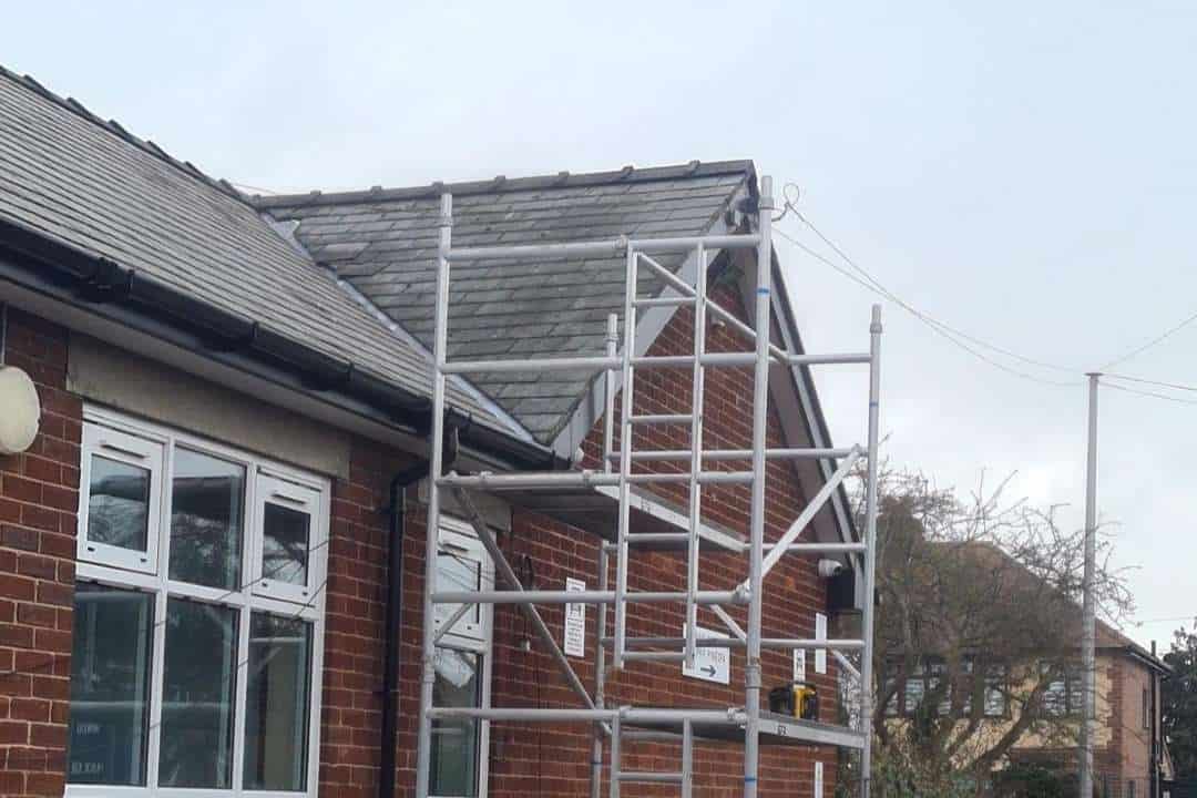 At work on a roof repair in Penrhyndeudraeth, North Wales