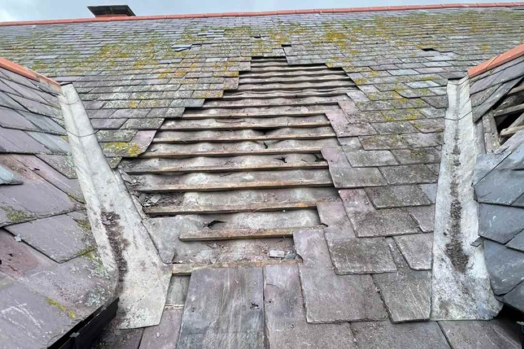 At work on a roof repair in Conwy, North Wales