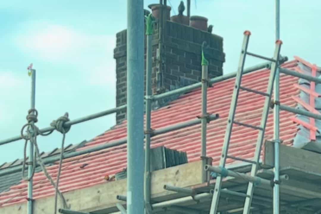 Working on roof restoration in Bangor Working on roof restoration in Bangor, North Wales
