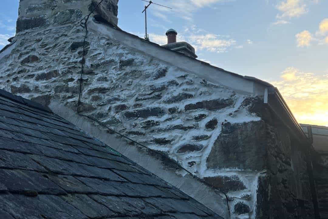 Our team fixing a roof in North Wales Our team fixing a roof in North Wales, Wales and North West England
